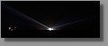 The three white lights on the left hand side are the 300-foot lightning towers installed at pad 39A for the Constellation program.