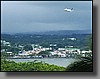 An Aloha flight prepares for landing over downtown Hilo.  