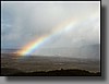 A vibrant rainbow over the Kilauea Caldera.